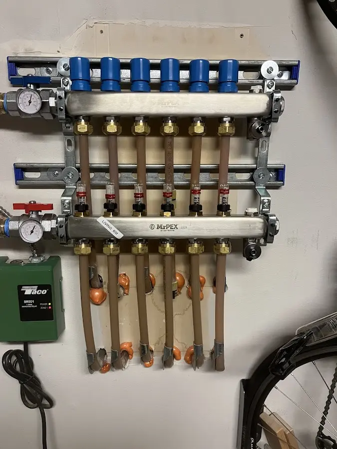 Plumber performing Gas Line Installation at a residential property in Glassmanor